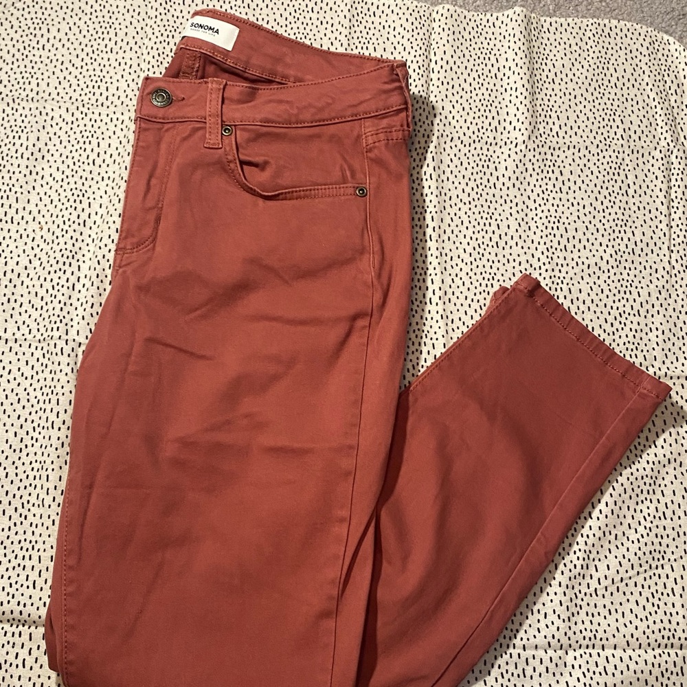 Pink/salmon colored skinny jeans